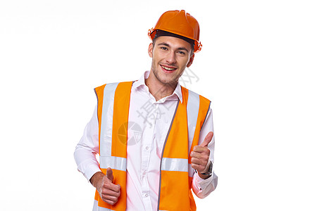 橙色统一制服职业轻背景的员工精神力工作者头盔植物建筑帽子建筑师工人技术领班承包商工程图片