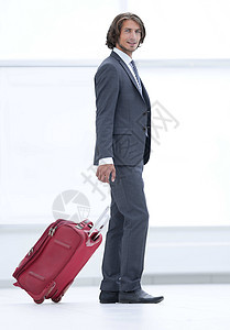 带行李的英俊商务人士白色男人工作生意人商务人士成人旅行职业游客图片