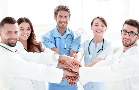 医生和护士搭配手 互助的概念 掌声职员临床医师职业团队专家药品男性成人外套图片