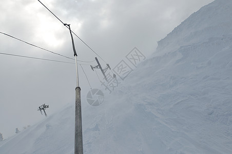 滑雪电梯高山行动滑雪板旅行速度运动活动滑雪者升降椅季节图片