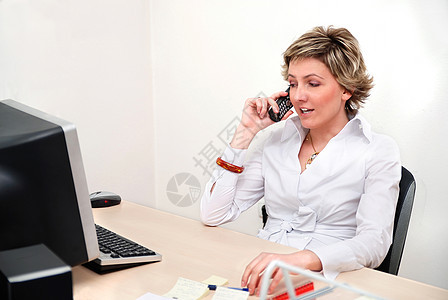 现任商业妇女电脑技术团体经理眼镜人士秘书微笑女孩电话图片