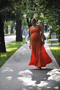 怀孕期橙子裙子女士卫生娱乐妈妈母性草地母亲喜悦图片