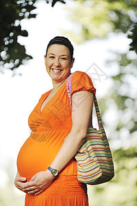 怀孕期橙子女孩裙子妈妈母亲卫生喜悦父母保健女士图片