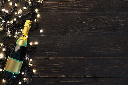 香槟酒瓶和加兰的圣诞节边界图片