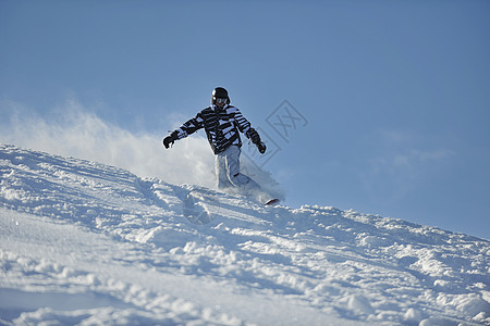 自由式滑雪机跳跃和骑冻结速度乐趣娱乐木板滑雪夹克喜悦假期天空图片