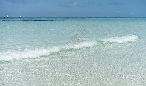 美丽的热带白色沙沙滩海洋海浪蓝色海景天堂晴天墙纸海岸风景旅行图片