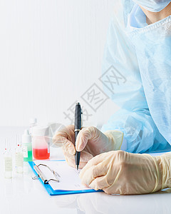 科罗纳病毒Corona病毒 医院医生值班 可以工作处方蓝色诊所试剂办公室女士暴发流行病学桌子测试图片