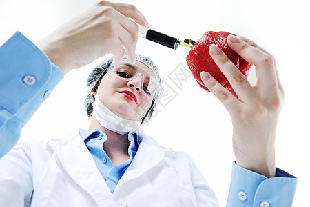 医生与红色的Pappper流感制药水果外科女孩科学饮食手术帮助成人图片