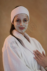 施用面罩的斯帕妇女沙龙女孩成人工作室女士身体肤色治疗皮肤护理图片