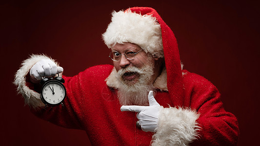圣诞老人有闹钟胡须男人庆典分发帽子传统快乐警报假期微笑图片