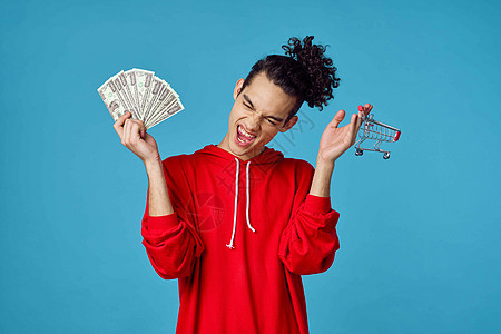 穿着红色毛衣的卷卷卷男 假扮时装现代时装销售投资套装企业家领带微笑百万富翁优胜者薪水金融图片