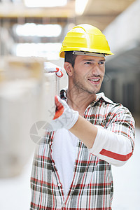 建筑工地的硬体工人男人工程师工作修理工安全劳动工业头盔商业建筑学图片