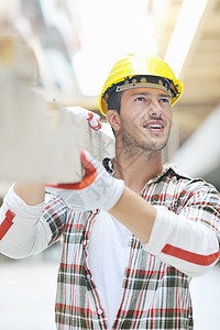 建筑工地的硬体工人安全帽工作工程师工程商业领班修理工成人公司黄色图片