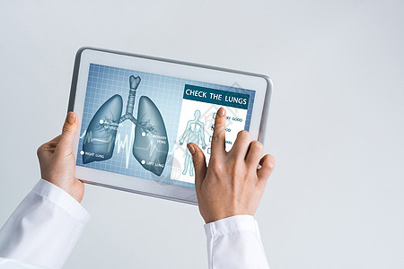与平板电脑合作的女医生近亲手技术监视器诊断女性卫生器官病人治疗护士笔记本图片