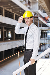 建筑工地建筑师建筑学男人安全工作男性商务工程师项目头盔蓝图图片