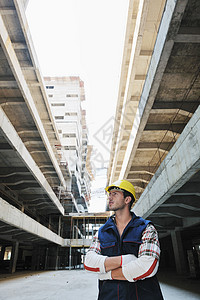 建筑工地的硬体工人建设者男人安全白色劳动修理工安全帽工作成人劳动者图片