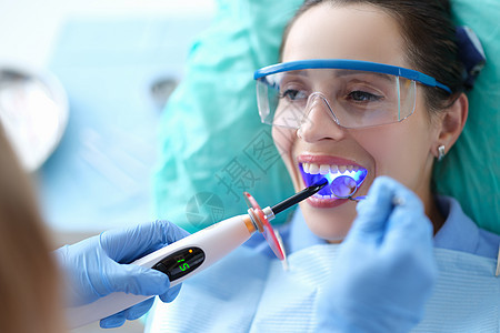 口腔口腔牙科聚合灯的牙科牙医工作手套假牙药品援助卫生医院牙科学治愈玻璃纤维检查图片
