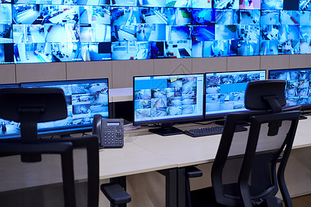 大型现代安保系统控制室的空内置安全系统控制室电话办公室桌子控制板安全房间控制服务中心警报图片