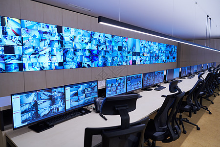 大型现代安保系统控制室的空内置安全系统控制室监控办公室技术视频控制板电话服务监视器物流电脑图片