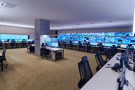 大型现代安保系统控制室的空内置安全系统控制室车站监视器监视房间办公室控制木板中心视频电脑图片