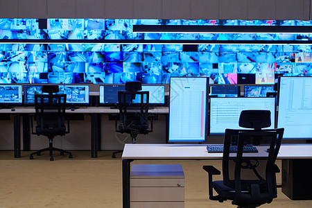 大型现代安保系统控制室的空内置安全系统控制室椅子展示商业视频互联网机构物流警报控制板车站图片