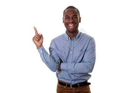带着手指对着孤立的白色背景的指尖的笑笑着的美籍非洲商务人士图片