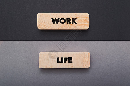 木条工作-生活平衡图 词的工作大于字的生活 商业概念 (business)图片