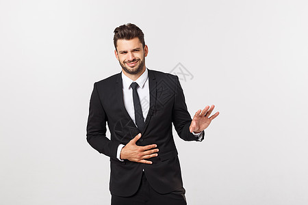 长着胡子的西装商务人士肖像 在室内演播室拍摄 在灰色背景下被孤立 A J商务痛苦腹痛饮食经理卫生套装人士男性疾病图片
