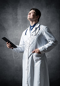 带电脑平板电脑的医生临床文件实习生学生保健药品工人护士治疗专家图片