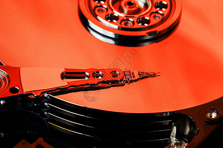 电脑HDD的硬盘是红色的 有镜面效果 计算机的硬盘驱动器已打开数据硬件贮存磁性服务器安全光盘技术电子笔记本图片