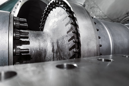 气体涡轮机压缩器的转筒 夹着半个螺栓联结叶片科学活力工程力量齿轮工厂历史性运输机械图片
