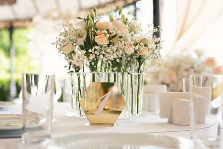 宾客桌号 餐厅的婚礼桌数字装饰品假期桌布陶器庆典派对装饰奢华花束图片