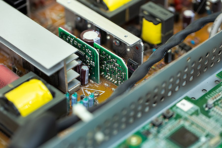 电路板 电动芯片 液晶电视的电力供应装置芯片电路处理器电阻器木板金属半导体电脑男人工作电容器图片