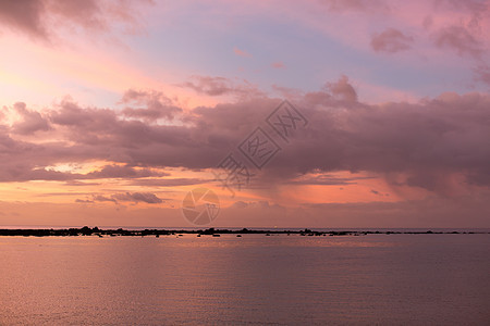 海洋上日落的空中全景观冲浪反射地平线天堂海滩橙子蓝色晴天天气天空图片