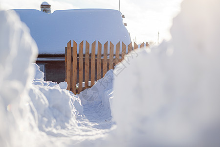 冬季大雪过后清理积雪活动成人暴风雪小路雪堆打扫季节琐事工作天气图片