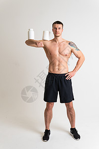 健身蛋白罐白色背景健美粉强高痛身体背痛病男药 肌肉慢性 感人的腰椎问题受诱人图片