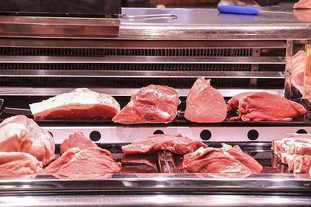 在阿利坎特中央市场内的肉摊消费者鱼片展示美食营养店铺商业质量柜台冰箱图片