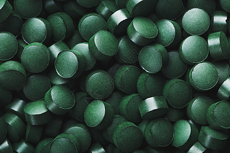 来自螺旋素素素食用食品补充品的绿药片药品矿物藻类螺旋小球藻治疗光合作用勺子食物细菌图片