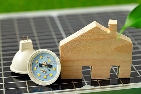 木制房屋微型和太阳能电池板特写控制板环境力量资源太阳能发电机生态集电极技术阳光图片