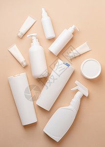 米色自然色背景化妆品用白色空白包装管和容器组 模型设计 生态友好治疗奶油推广保湿卫生推介会产品包装洗剂塑料图片