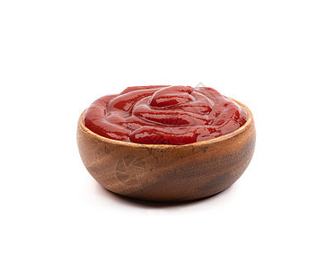 白色背景的木碗里新鲜番茄番茄酱图片