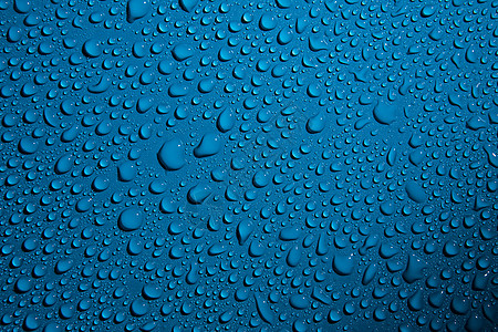 蓝色背景上的水滴墙纸反射实验室涟漪雨滴玻璃宏观嘶嘶天气气泡图片