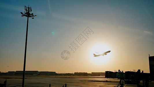 中国机场的日落黄昏 飞机起飞 北京动画片速度服务喷射飞行器航空公司空气航班航空喷气图片