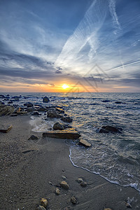 超大海景色 日落或日出多彩风景戏剧性旅游自然景观海浪太阳反射场景阳光蓝色图片