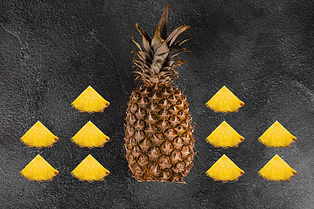 Pineapple热带水果 深石本底背景 柑橘果和维生素C 用于螺旋护理玻璃食物凤梨甜点植物饮料异国排毒情调营养图片