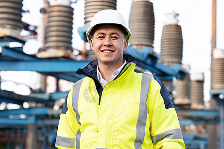 工业人 可持续能源 站在高压电站的安全帽亚洲生态工作者画像 技术图片