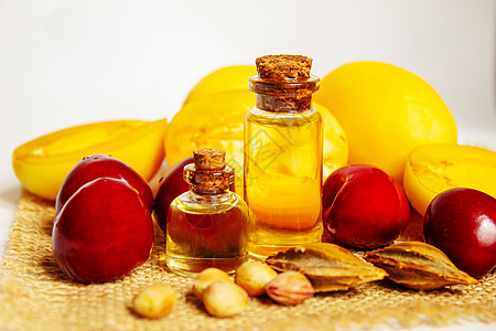 在一个小罐子里的杏子和樱桃油甜点水果饮食太阳橙子家庭市场维生素厨房乐趣图片