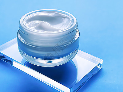 关于玻璃和蓝底 美容产品和护肤 化妆品科学的面霜润滑剂罐面具乳液女士蓝色护理样本洗剂奶油身体皮肤图片