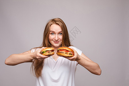 两个汉堡广告 加上多汁的鸡肉和沙拉快乐饮食蔬菜青少年女孩垃圾工作室女士情感芝麻图片