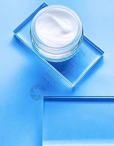 关于玻璃和蓝底 美容产品和护肤 化妆品科学的面霜润滑剂罐护理质量乳液身体小样美丽实验室面具奶油洗剂图片